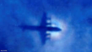 The shadow of a Royal New Zealand Air Force (RNZAF) P3 Orion maritime search aircraft can be seen on low-level clouds as it flies over the southern Indian Ocean looking for missing Malaysian Airlines flight MH370