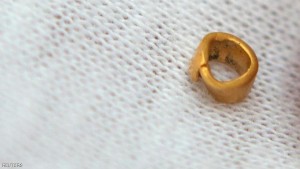 A 15-centigrams gold bead is pictured in village of Yunatsite