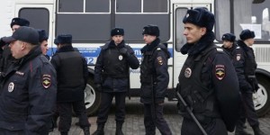 Policemen gather in the case of an anti-government protest in Moscow