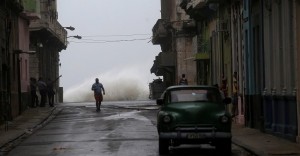 Waves crash on the street as Hurricane Irma turns toward the Florida Keys on Saturday, in Havana