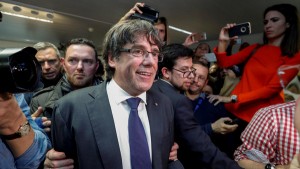 Sacked Catalan leader Carles Puigdemont departs after giving a news conference at the Press Club Brussels Europe in Brussels