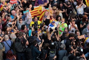 People react as the Catalan regional parliament voted to declare independence from Spain in Barcelona