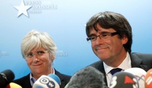 Sacked Catalan leader Carles Puigdemont and former member of the Government of Catalonia Clara Ponsati attend a news conference in Brussels