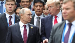 U.S. President Donald Trump and Russian President Vladimir Putin arrive for the family photo session at the APEC Summit in Danang