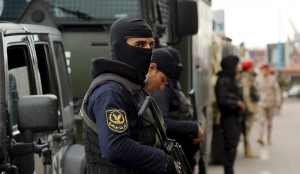 Security forces stand guard in Alexandria during the fifth anniversary of the uprising that ended the 30-year reign of Hosni Mubarak,