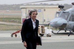 British Prime Minister Theresa May walks during her visit to RAF Akrotiri