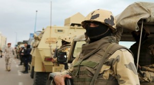 Soldiers stand guard in Alexandria during the fifth anniversary of the uprising that ended the 30-year reign of Hosni Mubarak