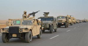 Egyptian Army's Armoured Vehicles are seen on a highway to North Sinai during a launch of a major assault against militants, in Ismailia