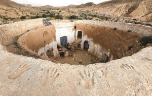 The Wider Image: Last residents hold on in Tunisia's underground houses