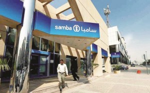 A man leaves Samba bank in Riyadh