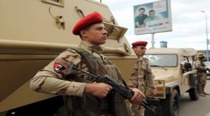Soldiers stand guard in Alexandria during the fifth anniversary of the uprising that ended the 30-year reign of Hosni Mubarak,
