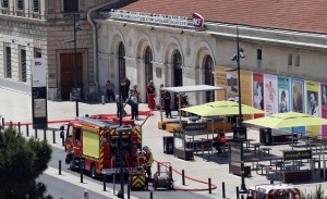 French fire brigade and police are seen outside the Gare Saint Charles train station which was evacuated after an alert in Marseille