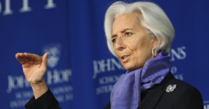 International Monetary Fund Managing Director Lagarde gestures as she speaks about the global economy at the Johns Hopkins School of Advanced International Studies in Washington