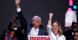 Presidential candidate Andres Manuel Lopez Obrador speaks next to his wife Beatriz Gutierrez Muller after winning the presidential election, in Mexico City