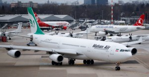 An Airbus A340-300 of Iranian airline Mahan Air taxis at  Duesseldorf airport